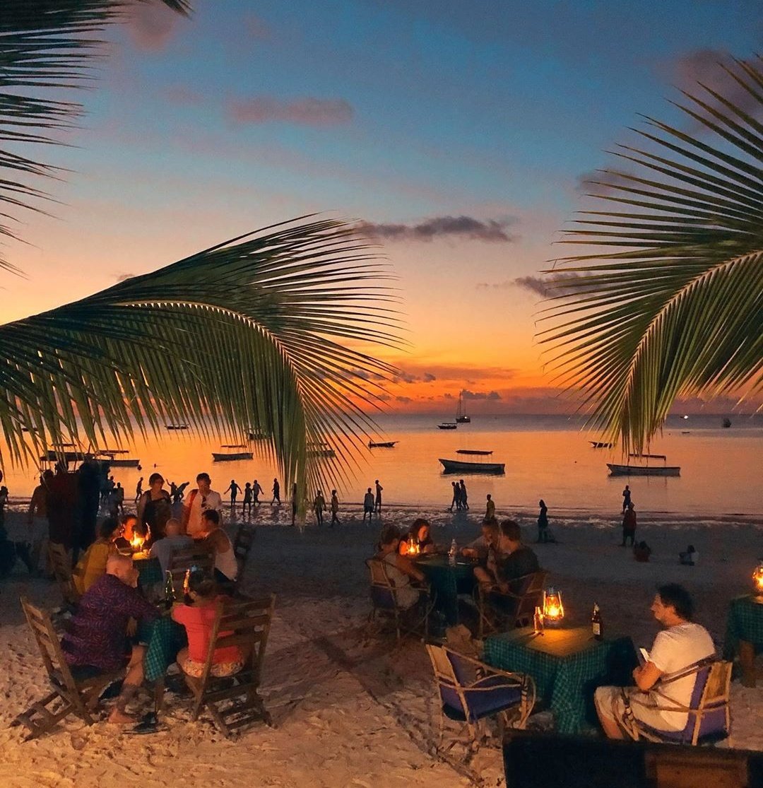 utafix's tweet photo. Good evening from Zanzibar Tanzania. What a perfect and clear Sunset view from Kendwa Beach! Would like to enjoy this?. Please book with us to enjoy your stay in Zanzibar: utafixafrica@gmail.com or DM us. #SunSetViweZanzibar #RefreshandRelax #NightParty #SeaFoodsInZanzibar. https://t.co/V1JoqoTkcp