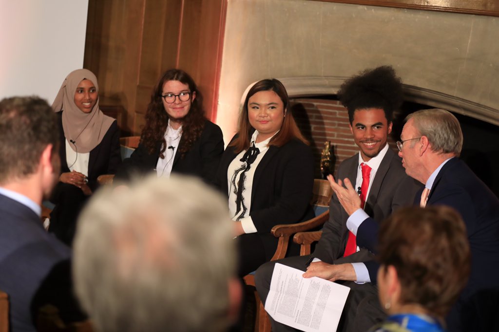 Young leaders discussing the new initiative with Eric Schmidt.