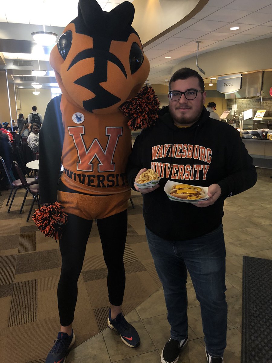 wbgalumni's tweet photo. Our friend and future alum Bill is enjoying a #WUDOG in the cafeteria with Sting! Stop by NOW for hot dogs, hot chocolate, candy and more awesome #WUDayofGiving treats! @WaynesburgU https://t.co/B7otzCIiMu