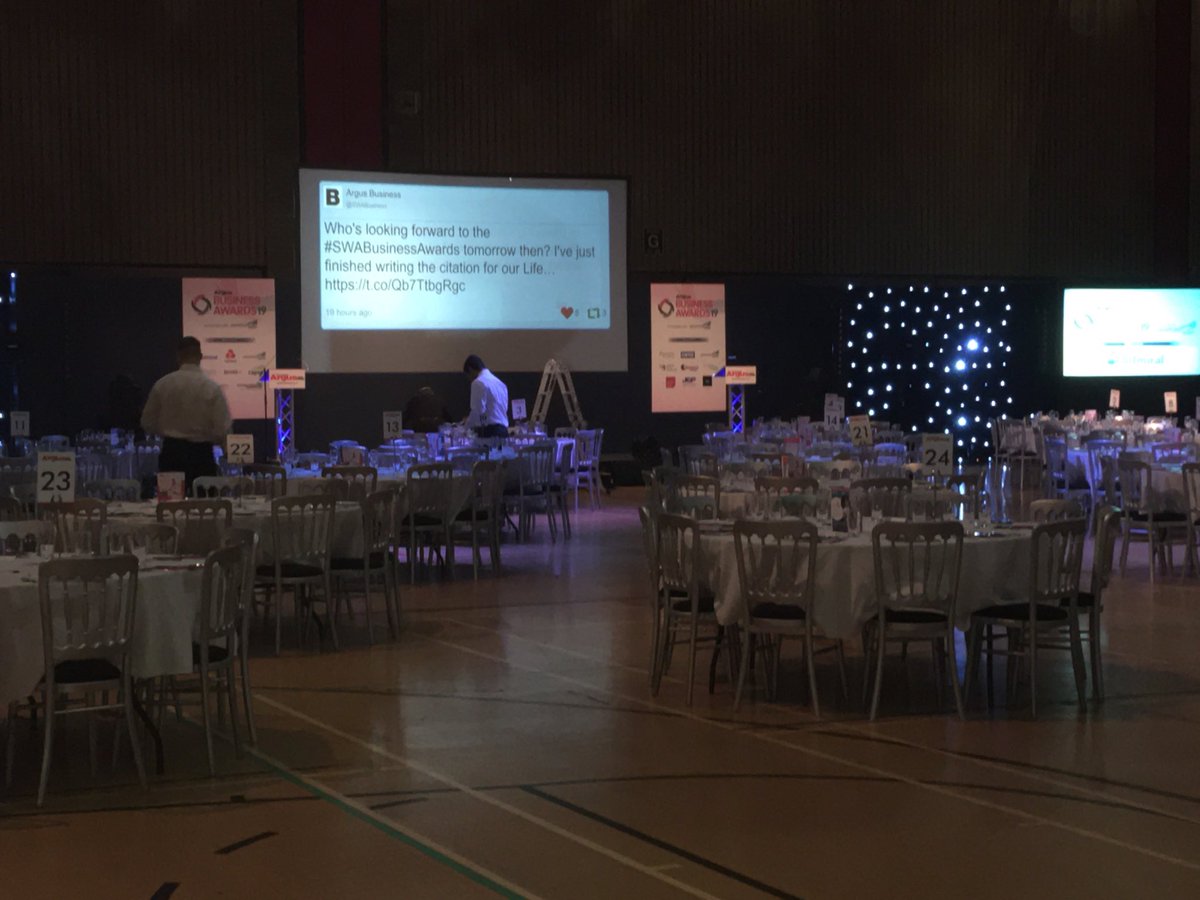 SWABusiness's tweet photo. The Newport Centre is looking good for tonight’s #SWABusinessAwards and the raffle table is laden! See you all later - hope you’re all excited! https://t.co/NcwiMDx8Cr