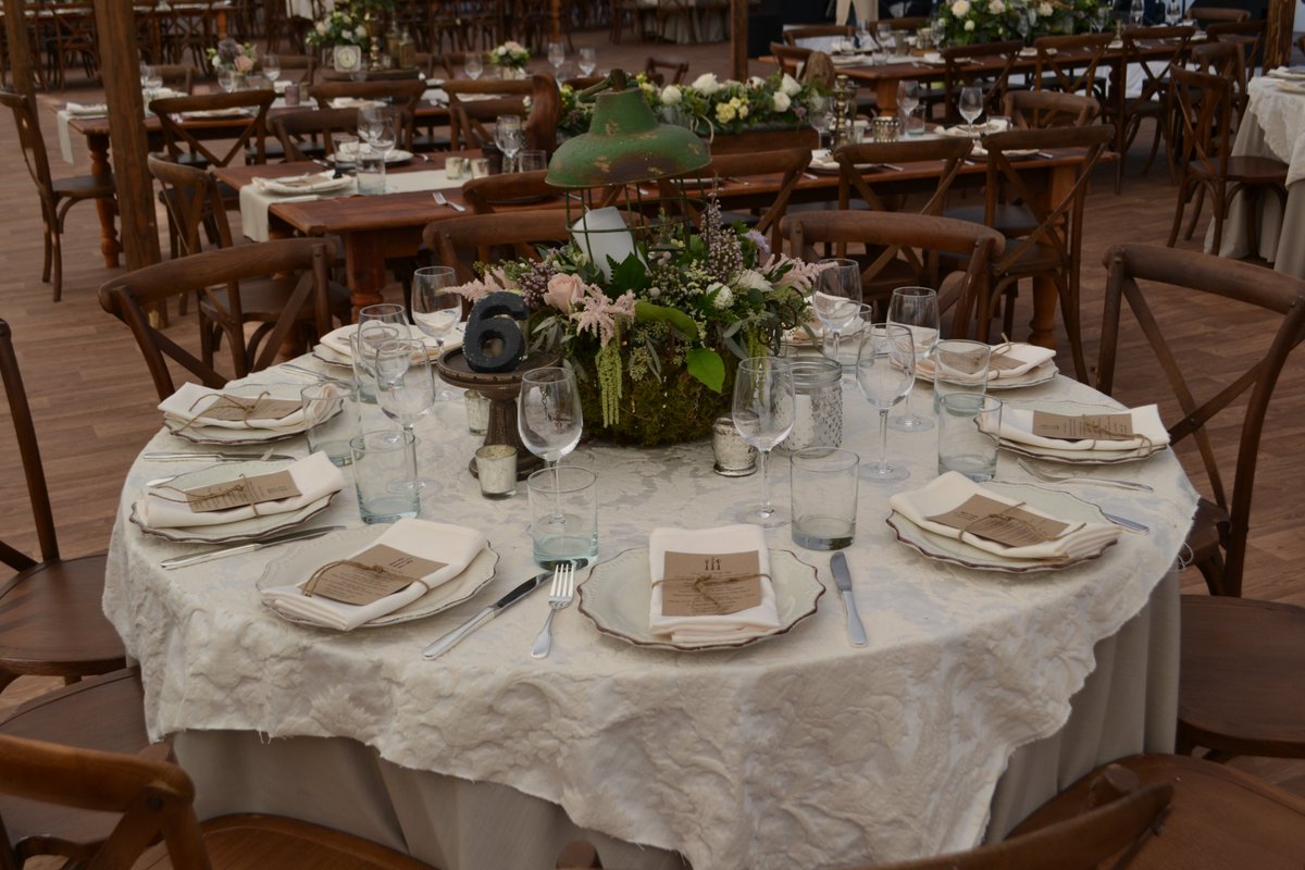 Nothing beats a perfectly executed rustic wedding #events #weddinginspo #rusticwedding #oceantents #tablesetting