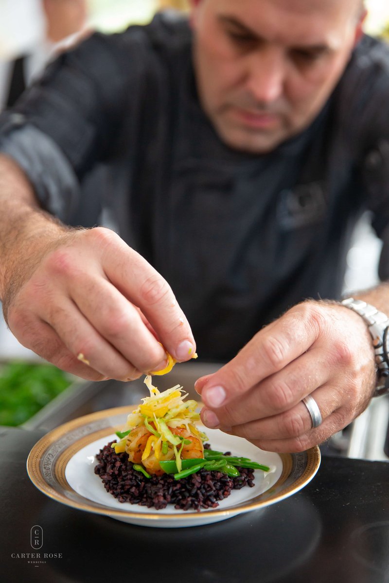 We love this shot of our Executive Chef Adam Fiscus by @carterrosephotography! From each hors d'oeuvre to every plate, all of our food gets a little love our team.
@arlingtonhallspecialevents
@adamjfiscus
.
.
.
.
.
.
.
.
#fgfcatering  #dallascatering #catering  #dallasweddings