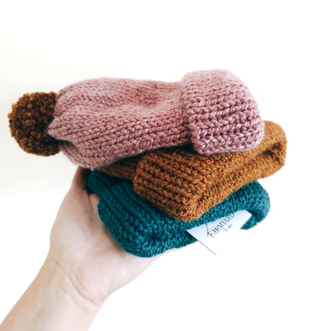 farmyardlabel's tweet photo. It's definitely bobble hat weather  this week! Our hats are hand knitted with love and care here in Ireland. Perfect for those looling for something local to gift this Christmas 🌲
.
.
#farmyardthelabel #irishknitwear #knitwear #babyshop #knit #knitting #handmade #madeinireland https://t.co/1IiI5p525T