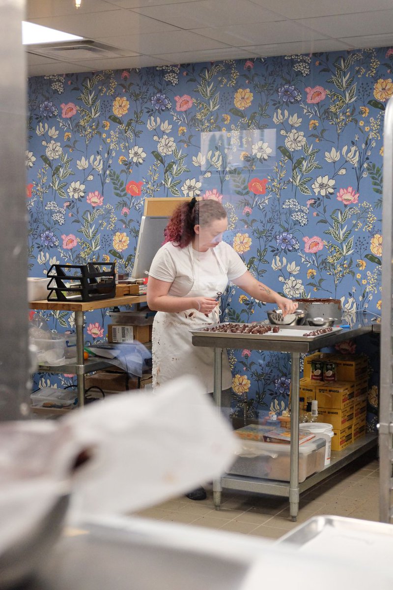 Sneaky peek through the windows of the chocolate kitchen. Yep. Making chocolate.