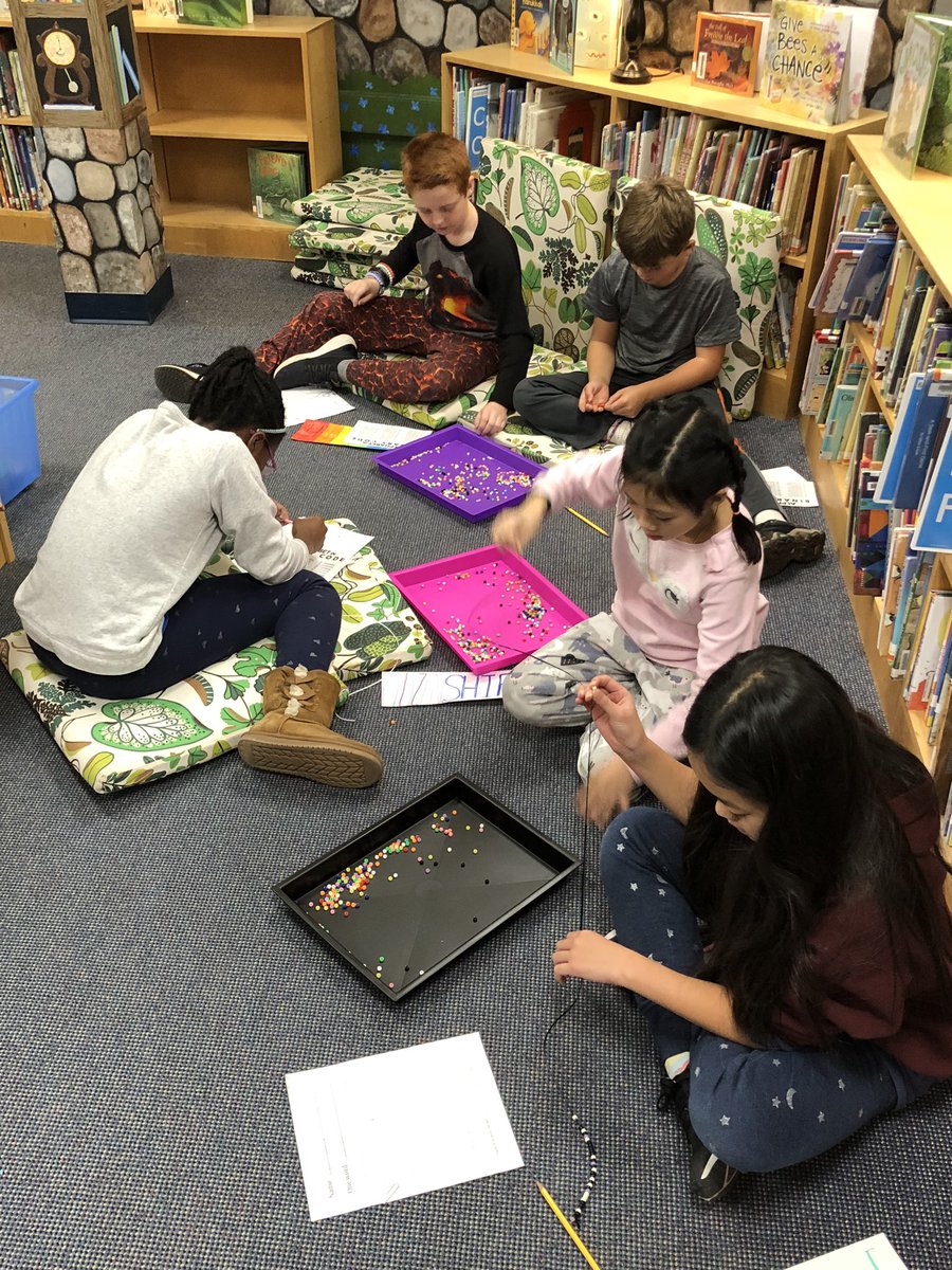 braeburnlibrary's tweet photo. 5th graders making binary code bracelets as we learn about Grace Hopper, and the initiation of modern computers. #HourOfCode @BraeburnBobcats https://t.co/T0Wq55vVM4