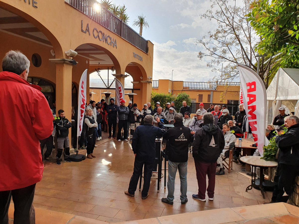 Welcome to day 1 of the Dragon Grand Prix Europen Cup Finals 2019. We have qualified 20 crews lined up to race this knockout competition. The briefing is introducing the competitors to the format including on water judging! #intdragon #dragongpfinal #puertoportals