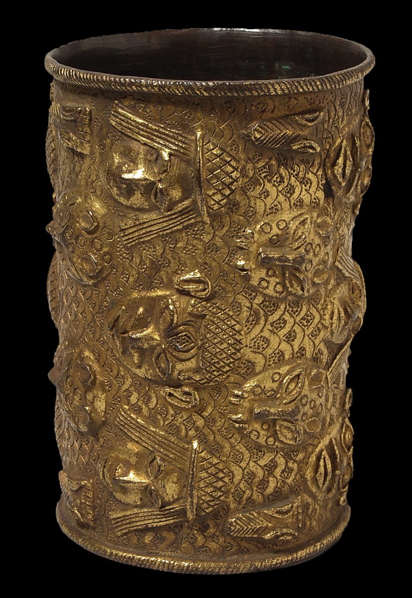 Gilded cast brass armlet with raised design of human heads, leopards and crocodiles, looted from Benin City in 1897  #Benindisplays