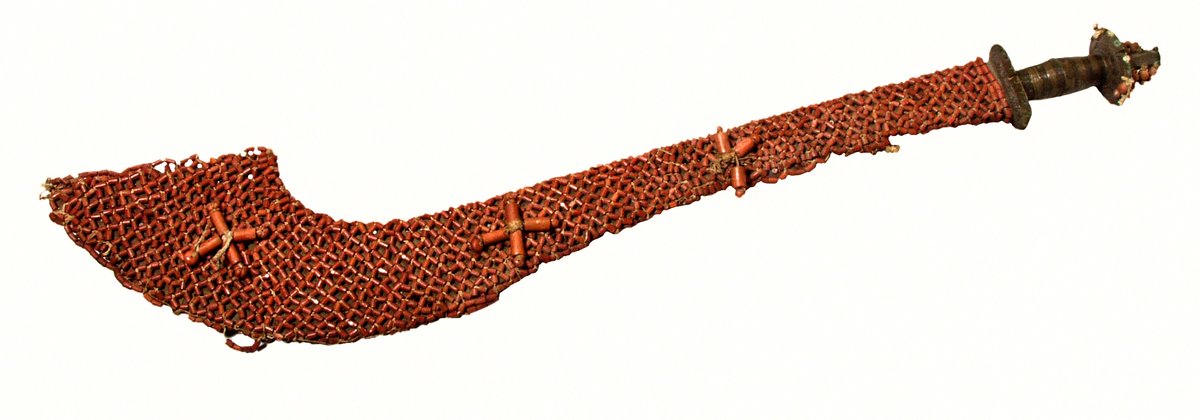 Ceremonial sword (ada) in coral beadwork sheath, again looted in 1897  #Benindisplays  @pitt_rivers