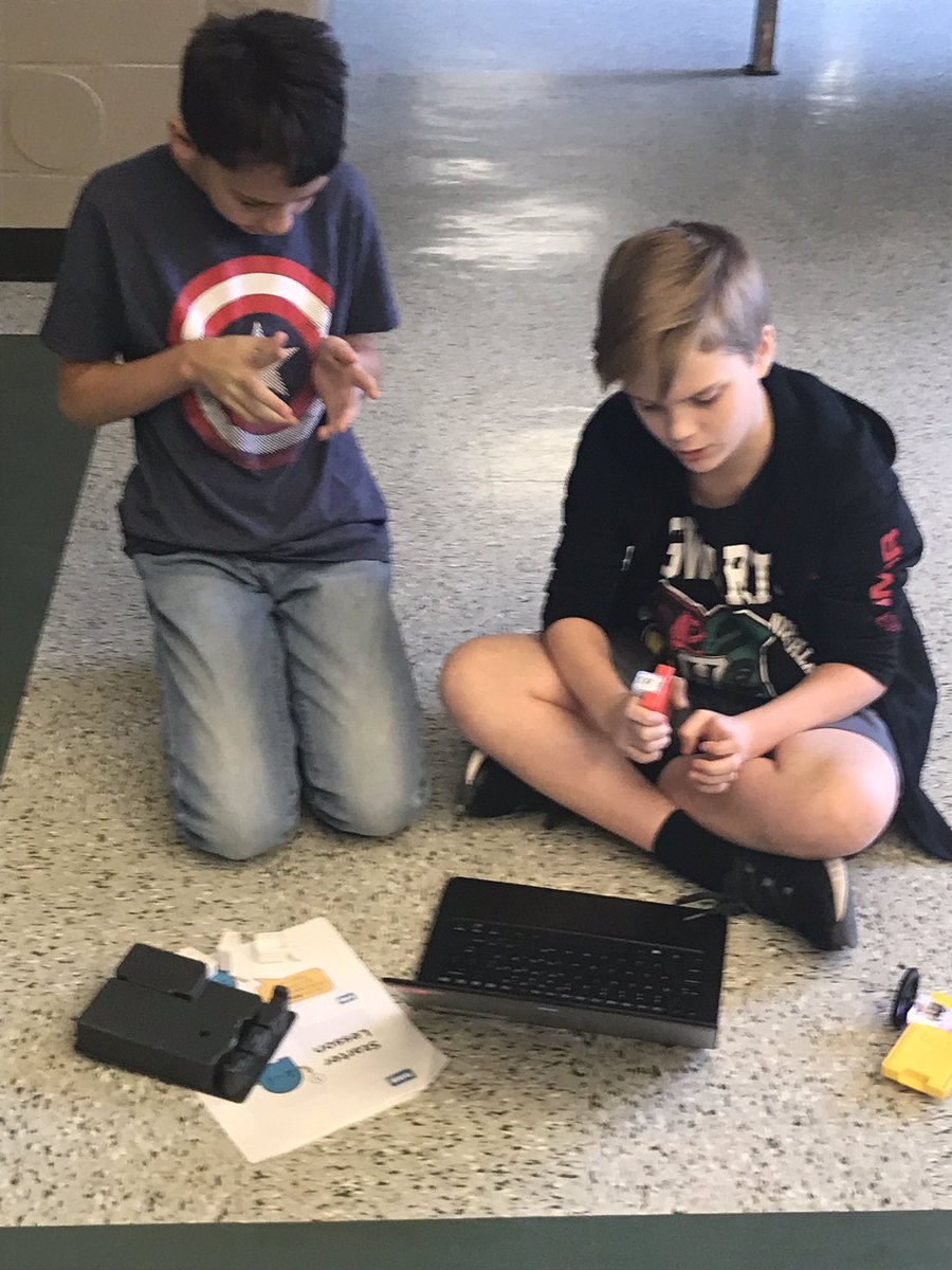 HuffakerCMS's tweet photo. I love when my students help each other. Gunner and Elias (7th grade students) teaching 6th grade students the basics of SAM Labs! #codingblocks #creeklife #feedthebears #ccsdstem https://t.co/kSt2abmEUk