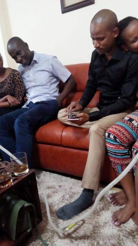 Babu Owino and Imran Okoth caught on camera celebrating Imran Okoth's win with slayqueens. I don't know what is that white substance Babu is holding but I think it can't be OMO. #BabuOwinoMPOfTheYear