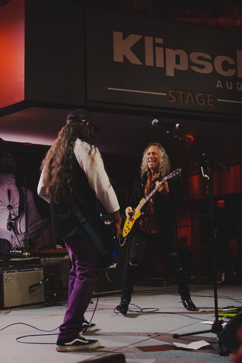 Metallica's tweet photo. Massive fun last night at the opening party for the Play It Loud exhibit at the Rock &amp; Roll Hall of Fame in Cleveland as @kirkhammett and @robtrujillo jammed on a number of ‘Tallica songs for a packed room of fans. Thanks to the @rockhall for inviting the boys to make some noise! https://t.co/lBpwDgedz8