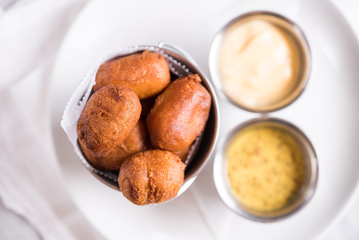 We can’t resist these corn dog nuggets with ‘mercian beer cheese and whole grain honey mustard, especially when they’re on #FaithfulFriday happy hour from 4pm to close at @bourbonpubsc. #NugLife #BourbonPubSC