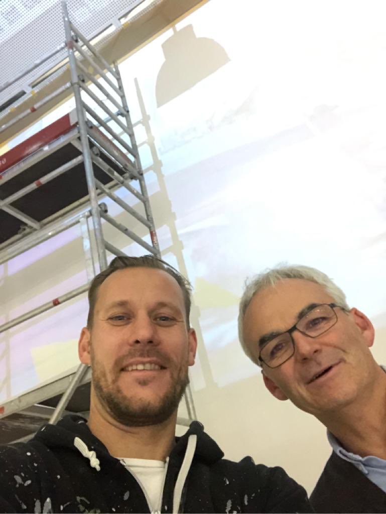 Part 1: No more white walls. The first line is painted. #beexited  #pimpLeinfelden <a href="/tsystemsde/">T-Systems DE</a>