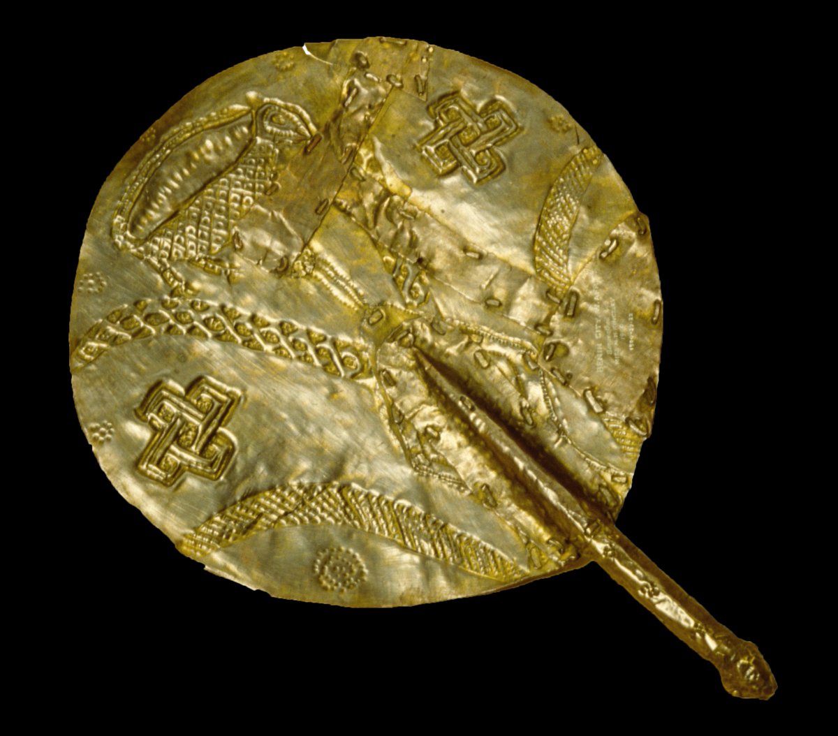 Brass fan with repoussé designs, taken from Benin City, Nigeria by the British in 1897,  @Pitt_Rivers  #BeninDisplays