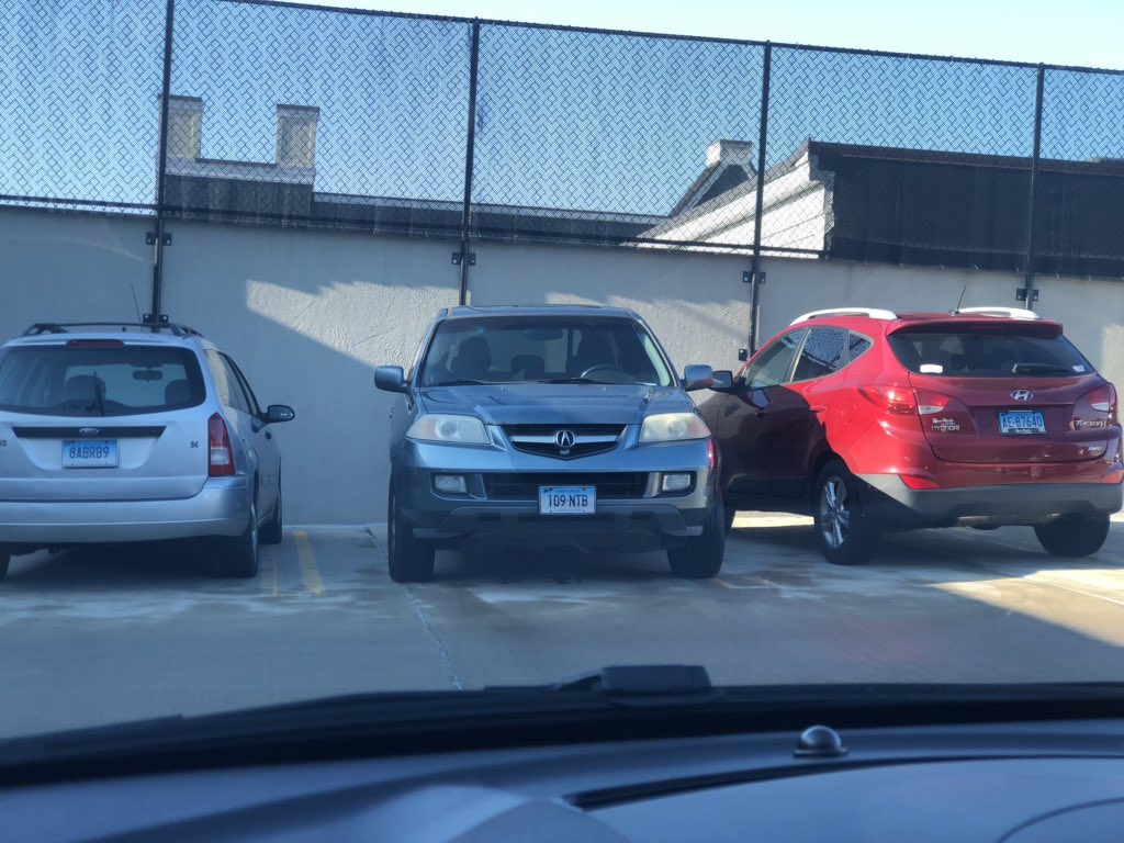 Crystal___Jean's tweet photo. Not one of these 3 people even attempted to park in the lines....ask me why I hate parking in this garage every day 😑🙄 learn to drive #UCONNStudents https://t.co/YC12yWpODb
