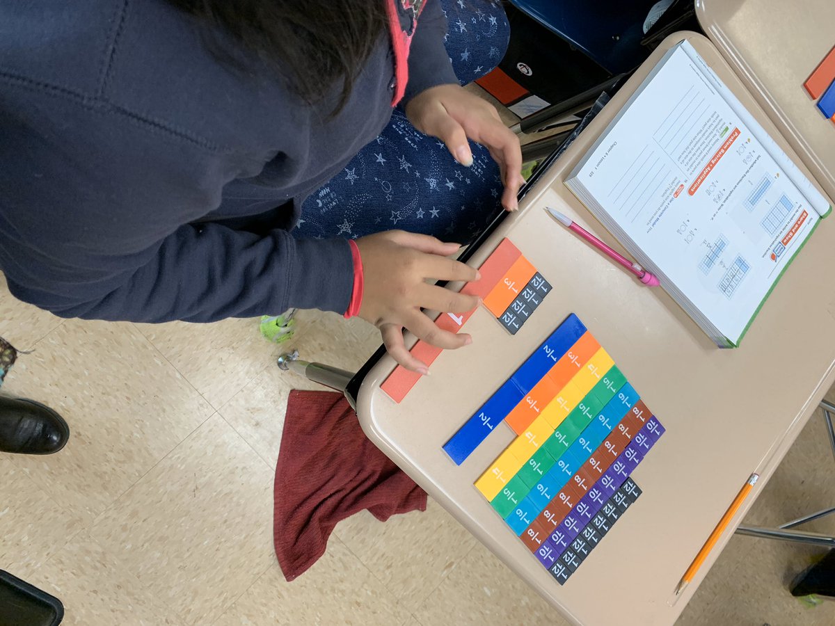 Ss using fraction tiles to check for equivalence!  This was a fun activity to help commit the skill to memory! #educatingeagles <a href="/racheladamstn/">Dr. Rachel Adams</a>