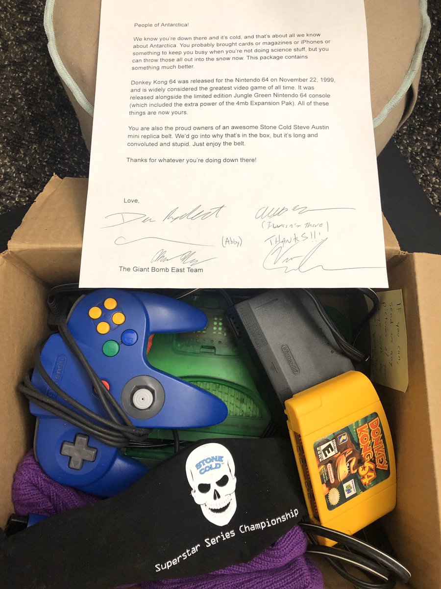 DanRyckert's tweet photo. A Jungle Green Nintendo 64 console, copy of Donkey Kong 64, and miniature Stone Cold Steve Austin replica belt are officially en route to Antarctica. https://t.co/tE0R6V05pv