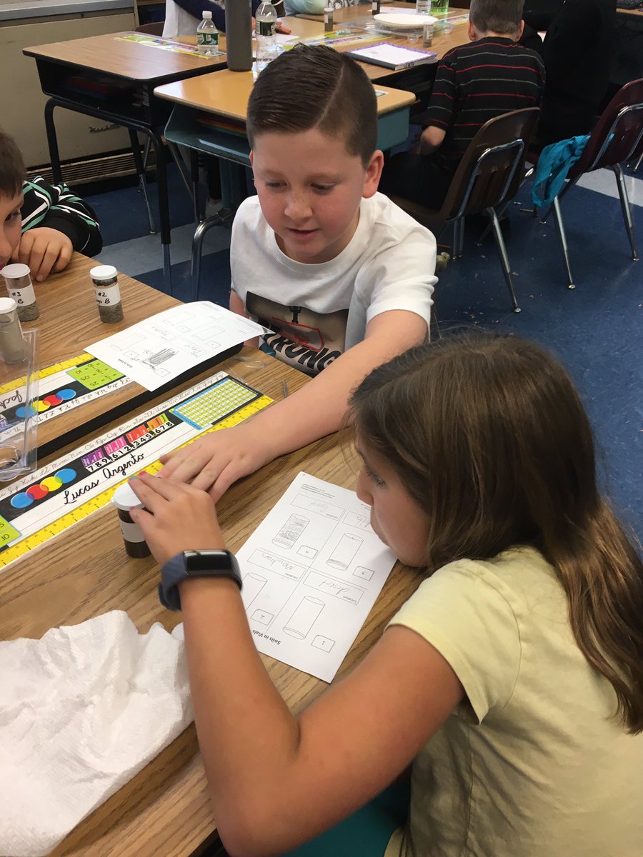 ms_goldstein3's tweet photo. Making observations of four soil samples after adding water and letting them sit overnight. @BAcastiello https://t.co/10klZvGdRt