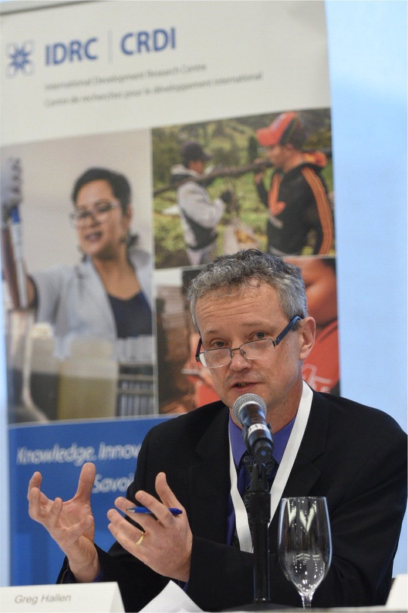 Person speaks in front of a microphone.