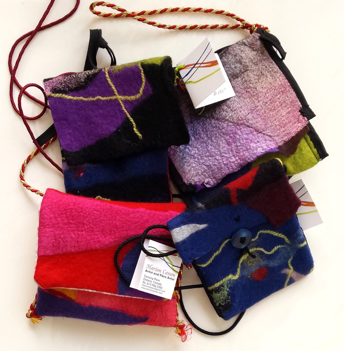 BellevilleArtA's tweet photo. New at the gallery ... hand made felt purses by artist Marion Casson, a perfect Christmas gift! #dtbelleville #bayofquinte #supportlocal #gallerydistrict https://t.co/vtGCAprbAL