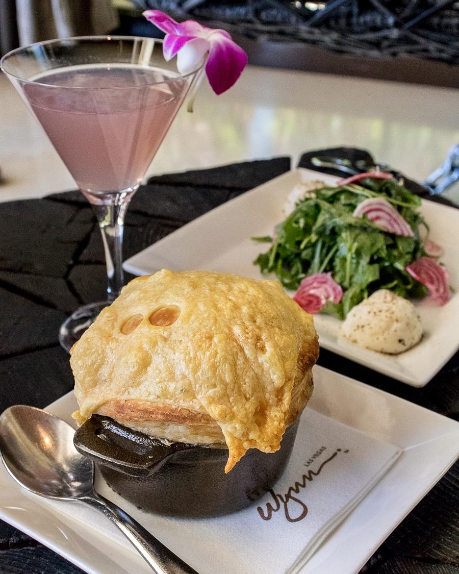 Crack into the puff pastry shell that encases the delectable Onion Soup. #lacavelv