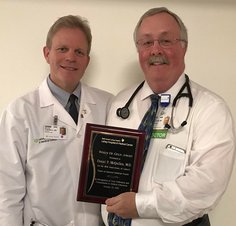 Shout out to Dr.Daniel McQuillen (on right) from the division of Infectious Diseases, who was recently honored as the recipient of this year's Words of Gold Award at the 48th annual Topics in Internal Medicine CME course held in Ogunquit, Maine. Well Done!