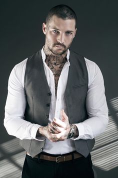 *sliding on my waistcoat, my eyes travel over to <a href="/KennaSnow_/">Kenna Snow</a> sliding my tongue over my bottom lip nipping it gently a growl softly slides out* fuck I dont know if I should be letting you go out like that....