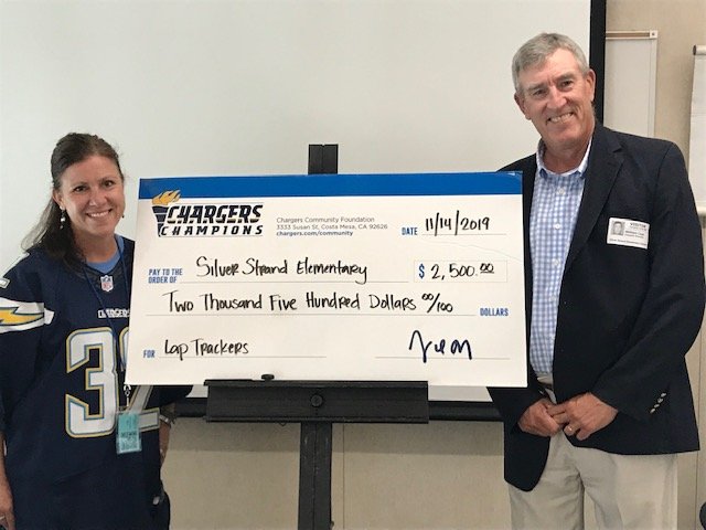 LA Charger football players and cheerleaders visited Silver Strand to award a $2,500 check to fund lap tracking devices. Thank you, Mr. Cass, for writing the grant and continuing to connect, challenge, and champion our students! #EveryChildEveryDay