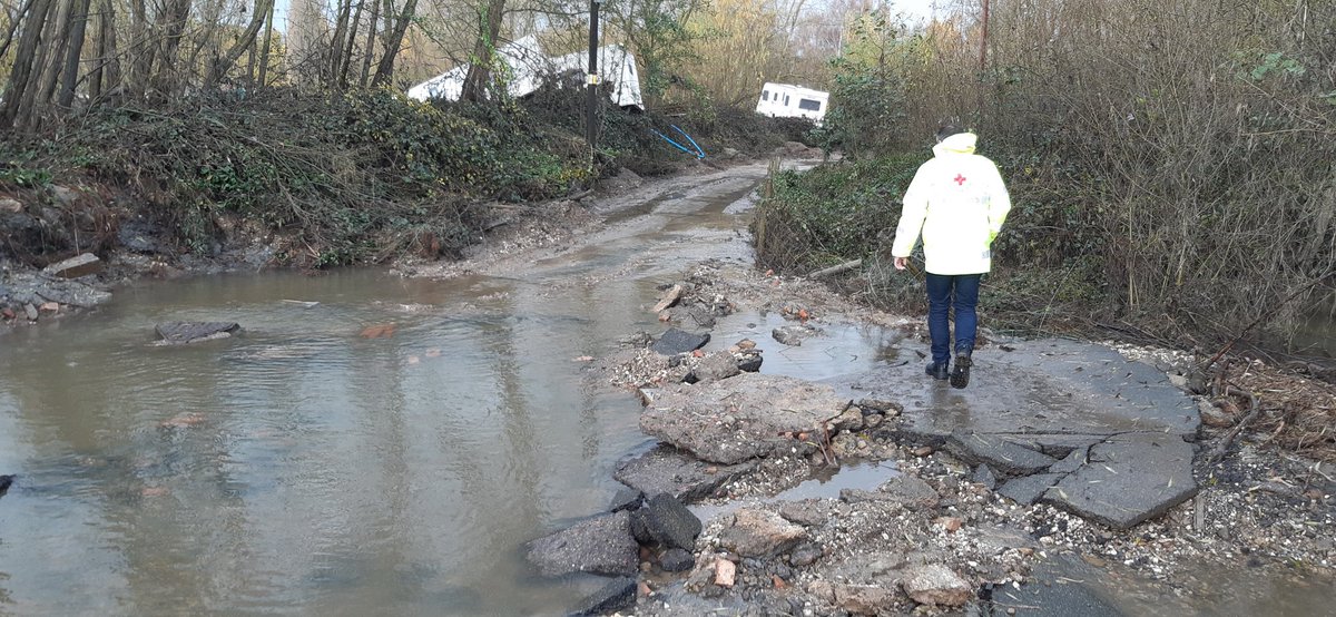 Me and my fellow <a href="/BritishRedCross/">British Red Cross 🧡</a> volunteer helped the gentleman who lived at the bottom of this road today. The water had risen over his roof, he'd lost everything and he and his family were lucky to escape alive. 

#Ukrain #flooding #floods
#TeamRedCross #powerofkindness