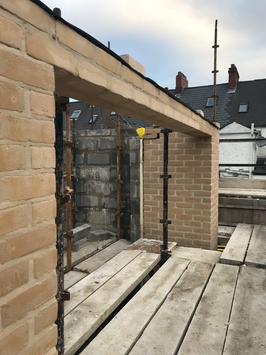 MetlocSystems's tweet photo. Pat Grant with Peter Murtagh of Ronan Murtagh Bricklaying Contractors, beside the innovative Metloc single leaf lintel complete with brick soffit tray. This is the first of many to be installed on a prestigious new apartment development on the Ormeau Road, Belfast. #lintels https://t.co/0y3yzoEUkw