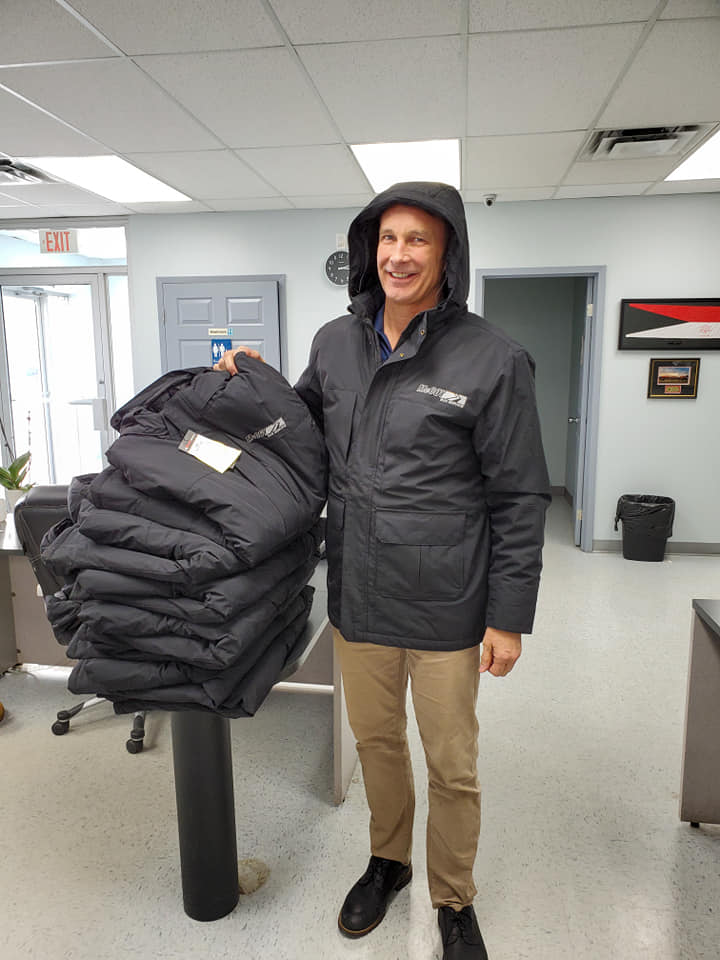 Go_McCoy's tweet photo. Shawn showing off the new winter jackets for our drivers!! ❄️ Don't they look awesome?? 😎 #WinterIsHere #GoMcCoy https://t.co/fkEebdNMOB