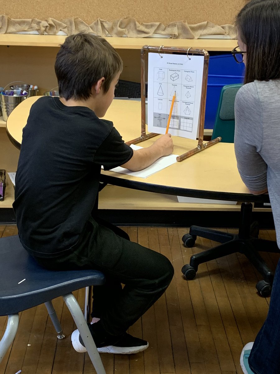 Using our new anchor chart stands to help us during our math! 🔢