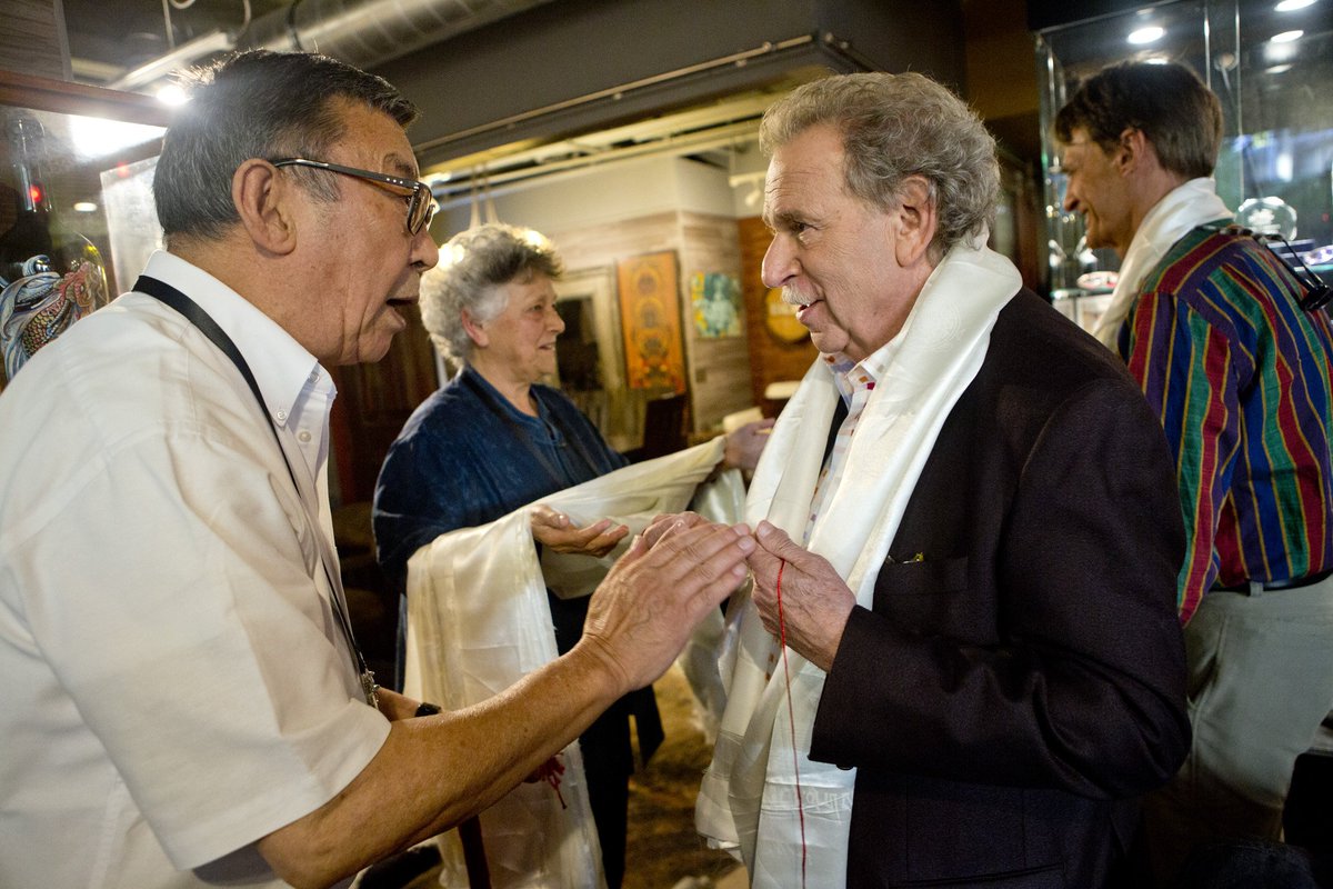 MVFilmFest's tweet photo. Tendzin Choegyal (the #DalaiLama's youngest brother) presents #MVFF Founder Mark Fishkin with a blessed shawl before a screening of Rosemary Radcliffe's THE GREAT 14th: TENZIN GYATSO, THE 14th DALAI LAMA IN HIS OWN WORDS. Photo by Tommy Lau. https://t.co/3jWq4BROvR