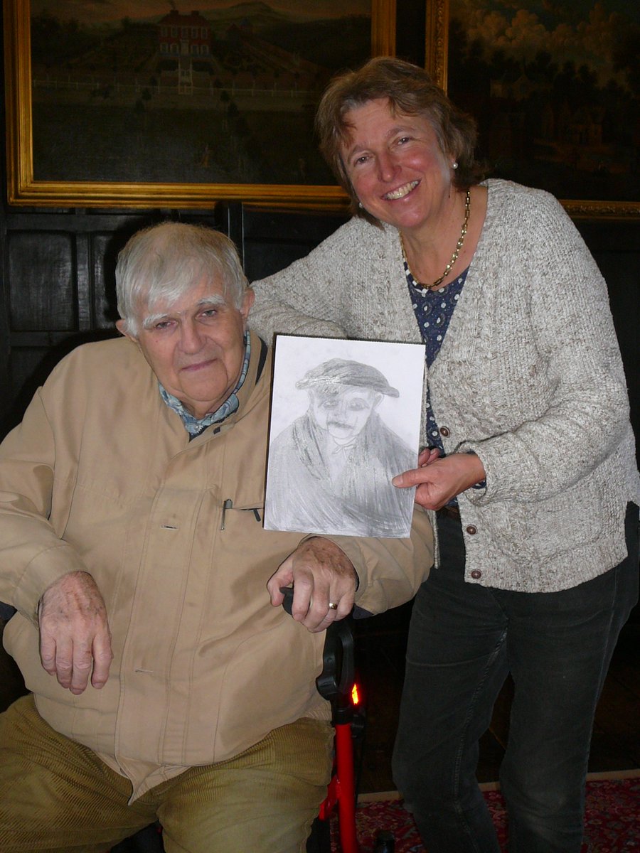 abbots400th's tweet photo. Artist Jane Allison pictured with resident Ian Henderson holding the winning portrait by Samuel Nod, aged 9 and the runners-up portraits by Anouk Nel, age 7 and Priscilla Men, age 5. They were chosen out of 16 entries from a competition held at #GuildfordHouseGallery @Gfdheritage https://t.co/2HN8FDfLrl
