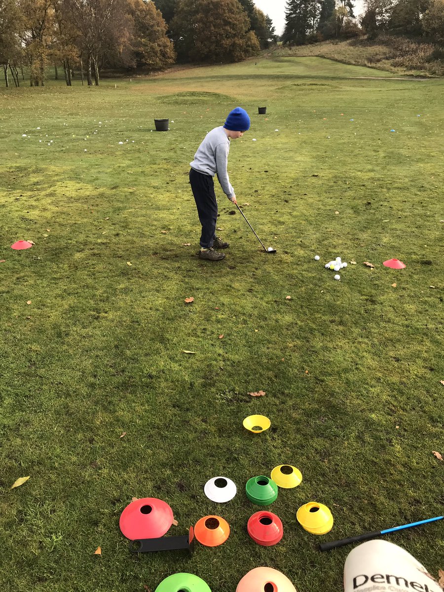 GolfStourbridge's tweet photo. Josh trying to chip into the baskets this morning during the junior lessons with @ChrisMoleGolf. The river that ran across the practise ground from the road and houses has disappeared and the golf course is in incredible condition and on all 18 main greens! #golf #juniorgolf https://t.co/FJKxBkcpPl
