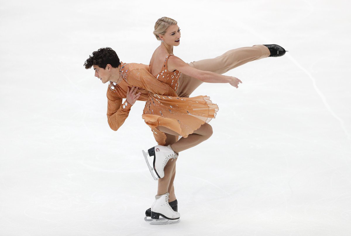 Canada's Piper Gilles and Paul Poirier won the silver medal on Saturday
