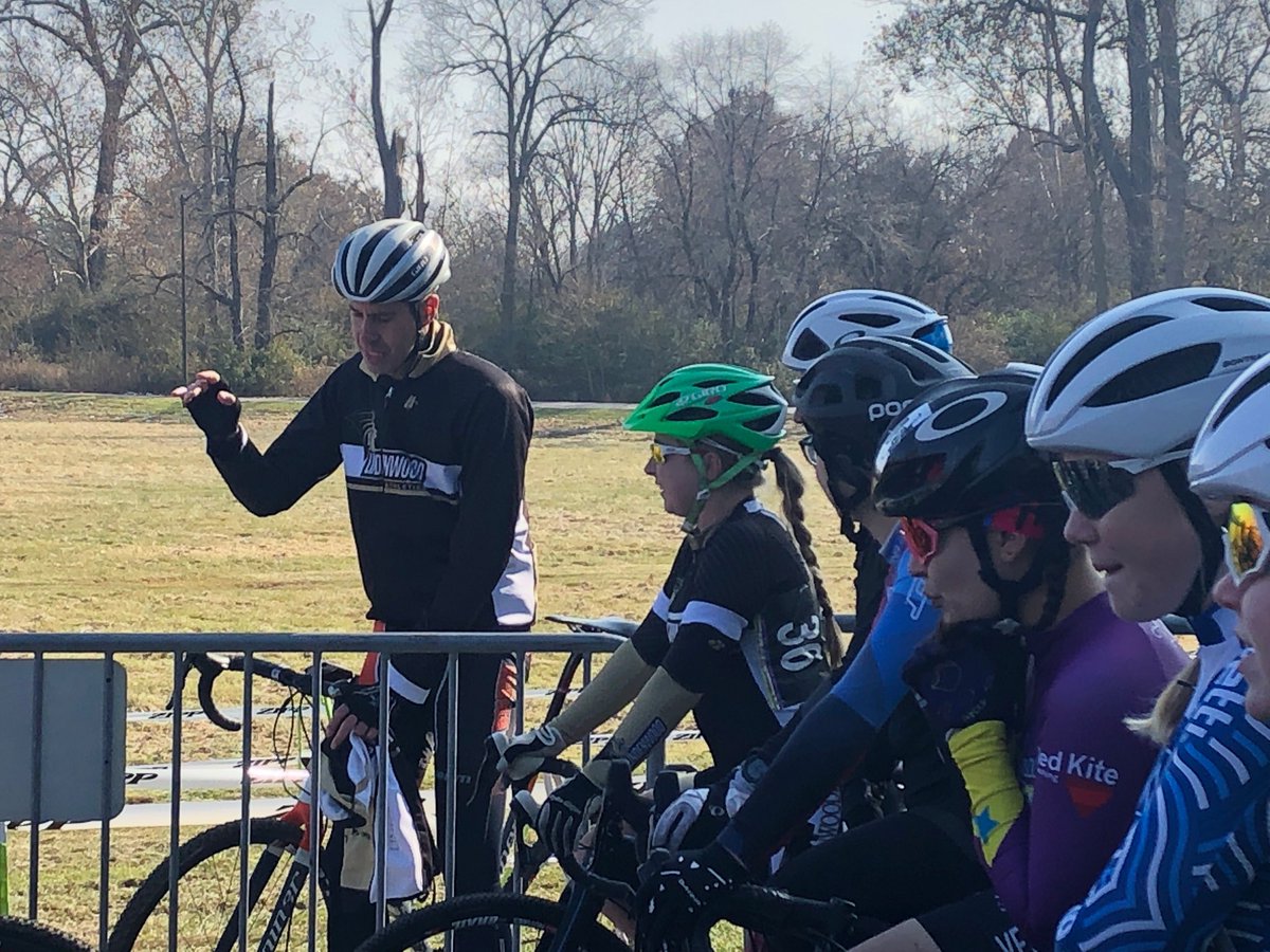 We have the best volunteer coaches!! John Rines giving Micah Mason some words of wisdom before her race #lionssupportlions #cyclocross #cx