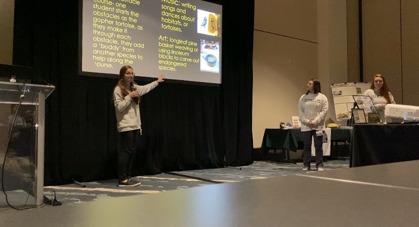 katie_hooksCCES's tweet photo. We have had a great time at the #gophertortoisecouncil meeting this weekend! We were extremely excited to present about our Gopher Tortoise Project and #adoptaburrow. First conference presentation done! #ksuteacherproject @madison_coral_ @ClarkCreekSTEM https://t.co/Vi84x4S2BR