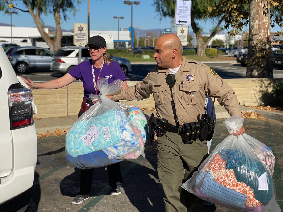 SCVSHERIFF's tweet image. Several bags of homemade blankets were dropped off by #ProjectLinus. Volunteers made the blankets to provide love &amp;amp; security to children who have been through trauma. Deputies are going to stock cars w/ the blankets so they’ll them on hand at the community vigil.