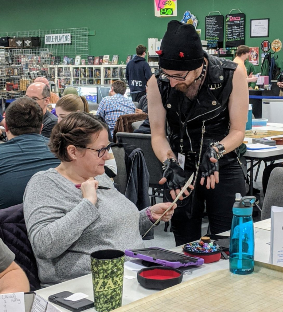 IanGGould's tweet photo. Day 2 #EXTRALIFE: Project #cookiebag, Infernal Pursuits, &amp; $1 re-rolls and a silent charity auction (thanks @ladydzra)! We've broken our $2,000 goal, and that's not including ticket sales OR $1 re-rolls for Forged in Fire today!! #ttrpg #4thekids @DnD_AdvLeague https://t.co/qQ3nUIfD1A