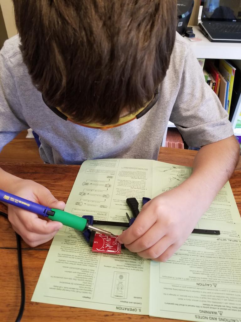 forsythebrf's tweet image. Teaching some some kiddos soldering using @HakkoUSA and building a light board.