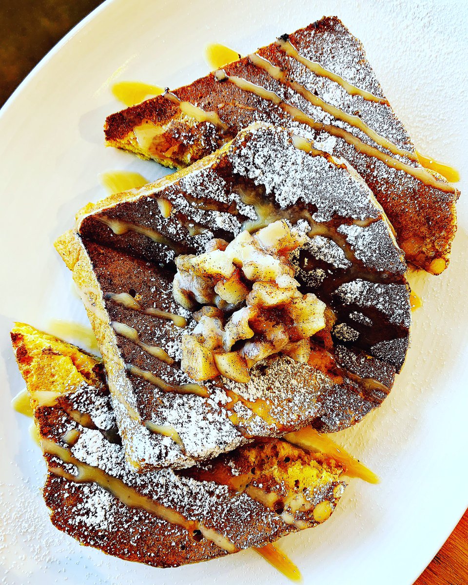 Making my way through the new brunch menu at <a href="/tasteproject_/">Taste Project</a>. Now putting away this gorgeous pumpkin French toast - housemade pumpkin bread topped with dulce de leche sauce and roasted cinnamon apples.