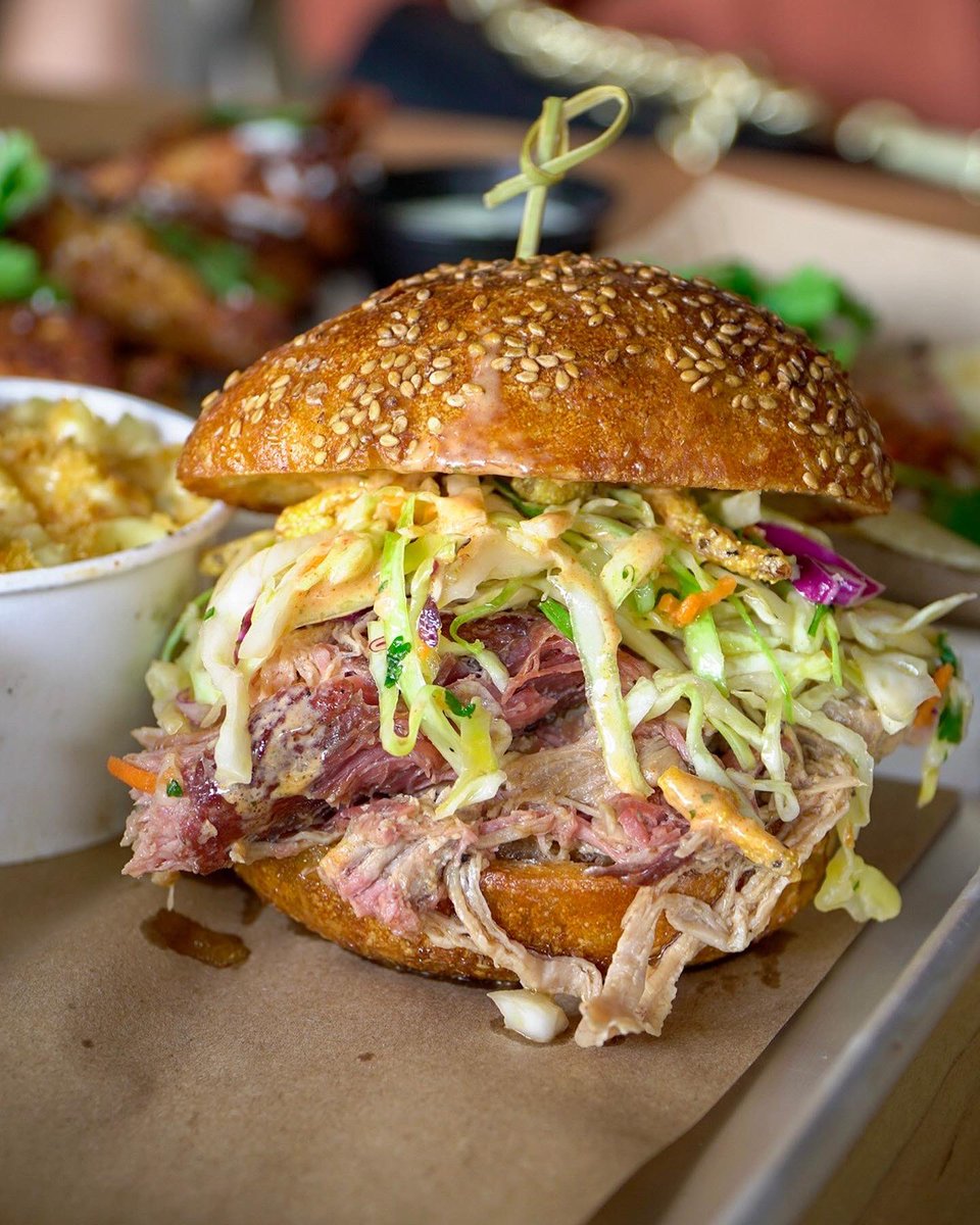 AlwaysHungryMel's tweet photo. Welcome to the Magic City @hometownbbqmiami! It’s the first location outside the Big Apple and we couldn���t be happier to have ya in the 305! You’re looking at the pulled pork sandwich 😍 SWIPE▶️ for the smoked wings (my fave), the brisket taco and some sides ☺️ #weekenddiet https://t.co/Ts1vJu5IMp