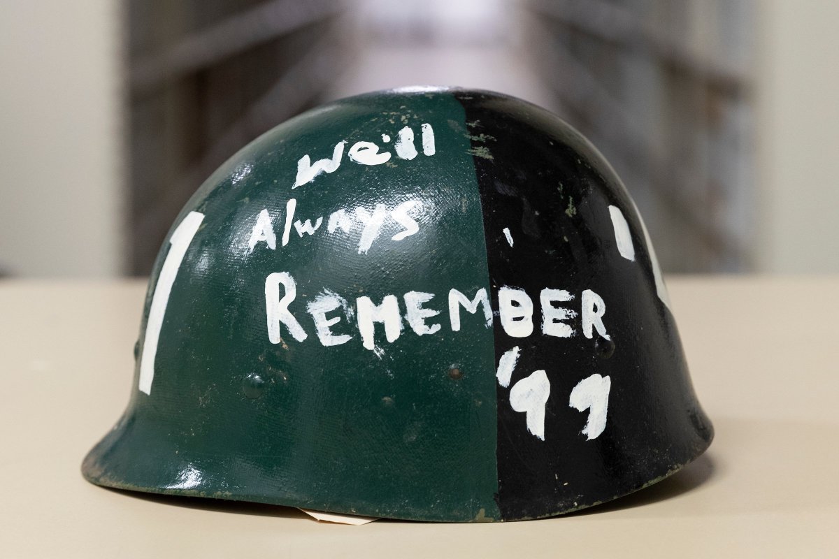 bonfire pot with paint on it reading we'll always remember '99