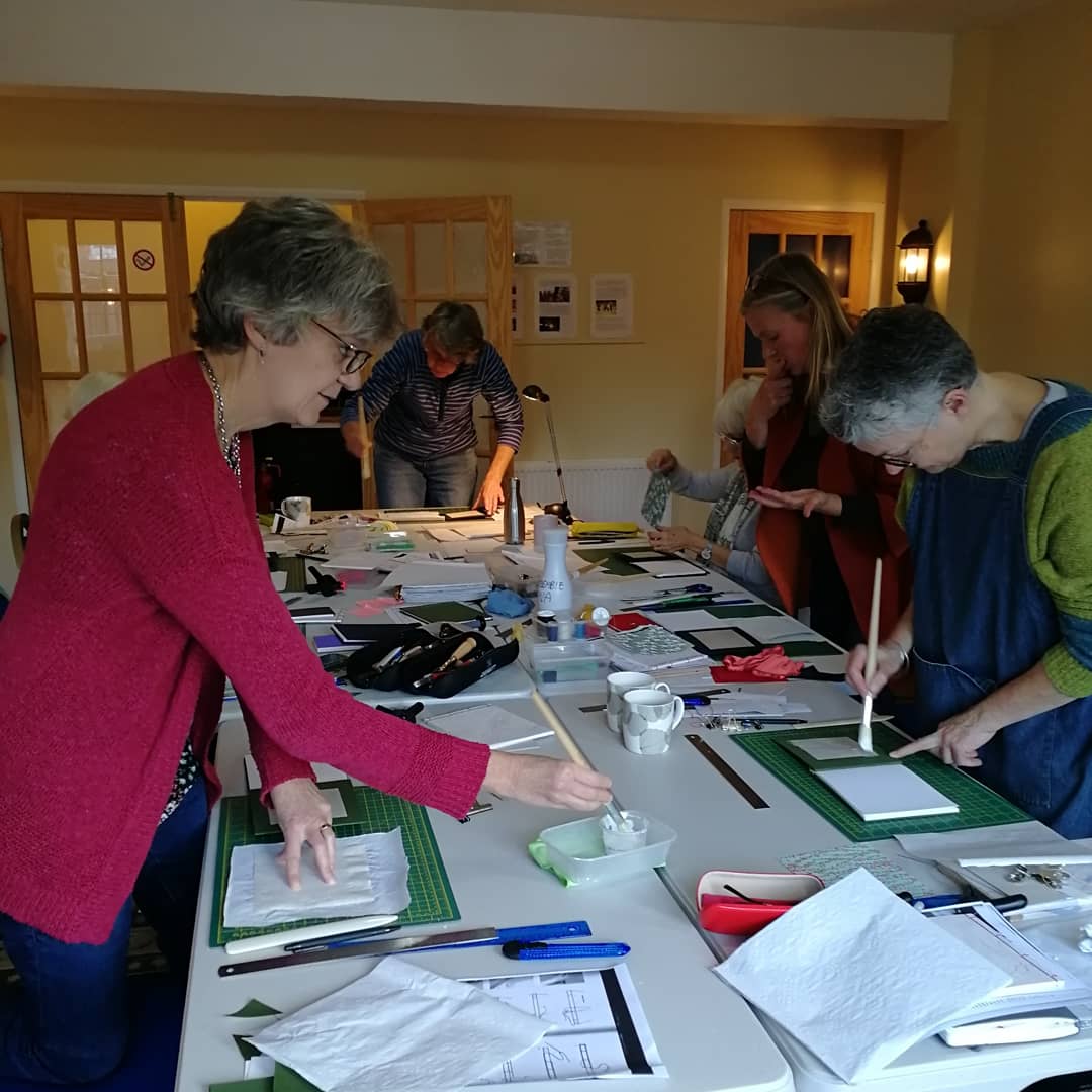 Bindfulnessboo1's tweet image. Wonderful books made in the most recent #bindfulness #bookbindingworkshop Fueled by @KitchenWasted lunches (and brownies - yum), we made three Japanese inspired four hole stab bound books. Gorgeous work. Keep up with future dates with my newsletter eepurl.com/gwy9MX