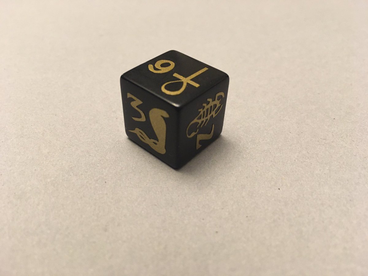 Since I finished my Data Arcana yesterday, putting together a  #dnd dice set for Inhapi, my grave domain cleric who follows the ancient Egyptian pantheon. Here’s the d6! Each symbol has a meaning that corresponds to one of the ability stats.