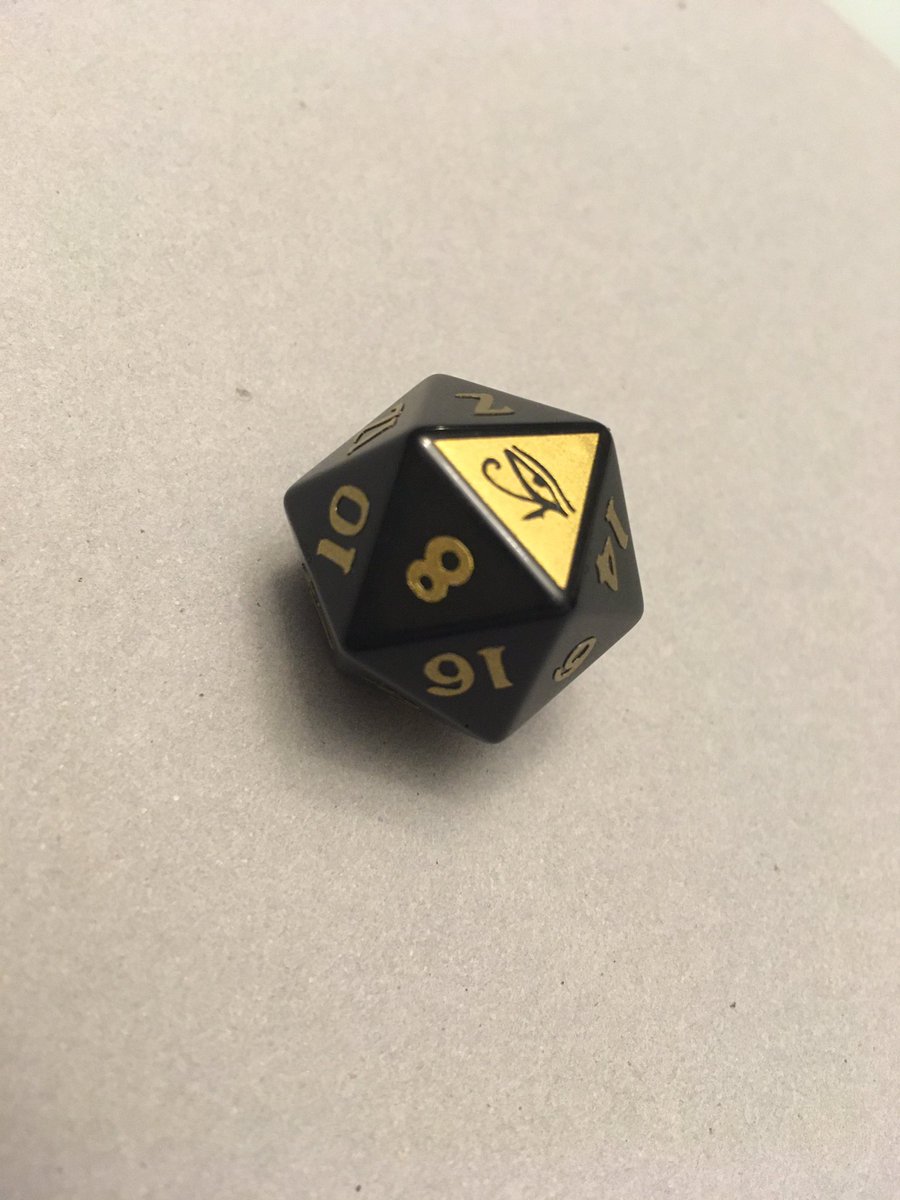 The d20, with the Eye of Ra (technically the Eye of Wadjet, but similar meaning) as the 20 and the serpent Apep as the 1. The two deities represent cosmic order and chaos, and so the character is embodied by the concept of their duality.  #dnd