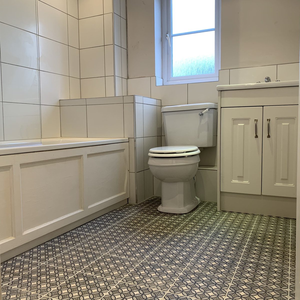 SuffolkTiling's tweet photo. Another bathroom installation completed using these striking Urban Axel floor tiles and classic flat white tiles, new toilet, vanity unit, towel rail and shower screen. 
#suffolktiling #tiling #suffolkprotiling #tiles #bathroominstallation https://t.co/GJERJYnFhw https://t.co/wEh1d0rGVW