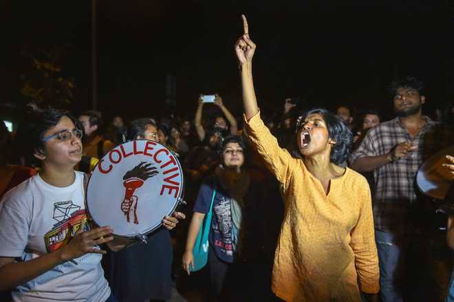 Baaba_Goel's tweet photo. These are the qualifications to become a "Revolutionary" #JNU student

- Age must be 40+
- Can tweet in English
- Can insult Swami Vivekananda
- Dress Code: Kurta with Jeans
- Sympathy for terrorists
- Hairs should be messy
- Taking drugs are mandatory.

#JNUProtests https://t.co/Imh76AGJkV
