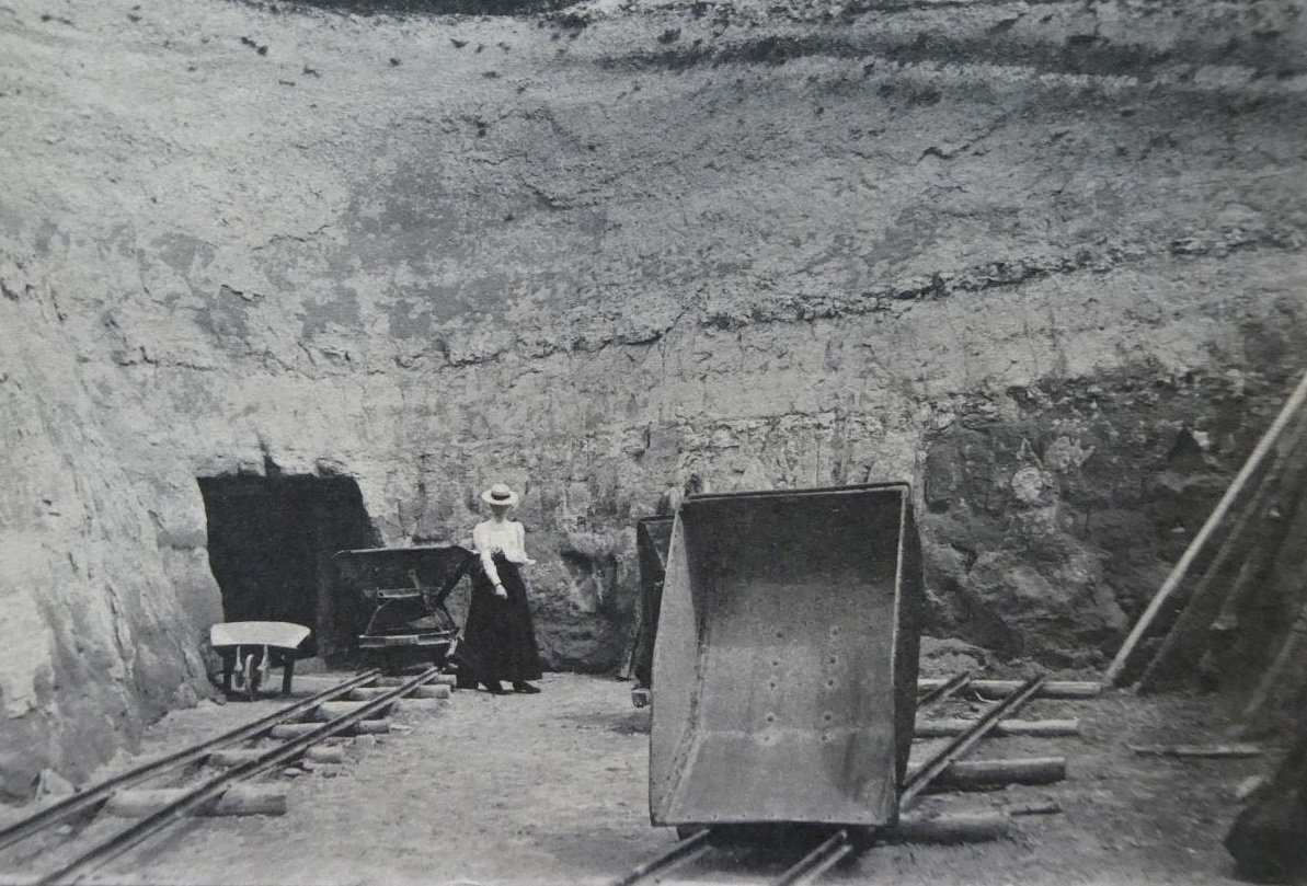 Can you help us identify if this photo is Reigate suffragist, geologist &amp; Newnham graduate, Margaret Chorley Crosfield. It was taken at Godstone Heathstone Quarry by friend and colleague Mary S. Johnston, 16 June 1900 <a href="/SurreyHeritage/">Surrey History Centre</a> <a href="/GeolAssoc/">Geologists' Assoc</a> <a href="/Newnham_College/">Newnham College</a> <a href="/BritSciAssoc/">British Science Association</a>